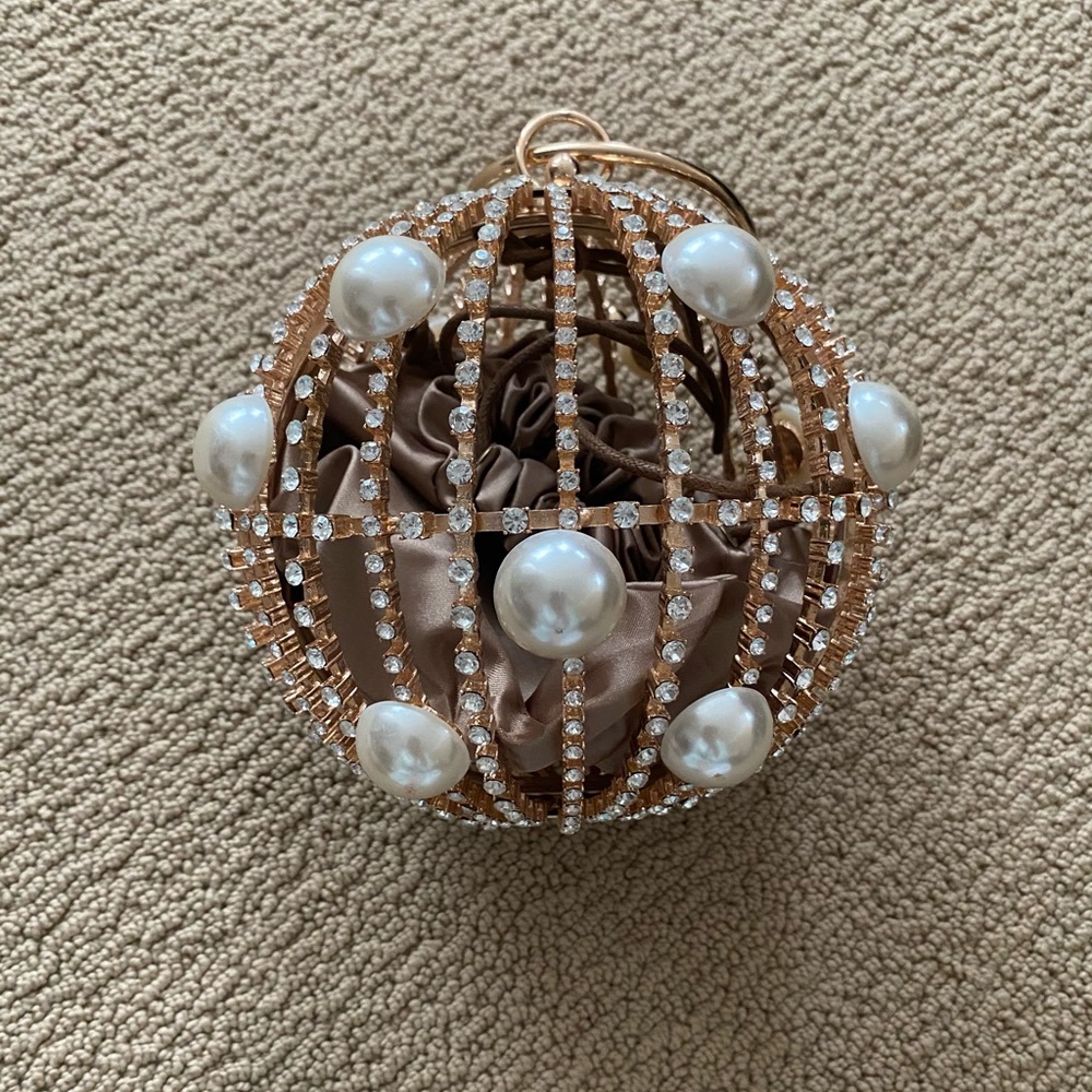 Pearl and rhinestone round bag